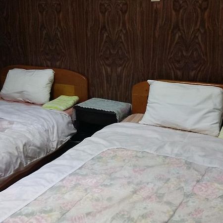 Minshuku Toshi Hotel Якушима Екстериор снимка