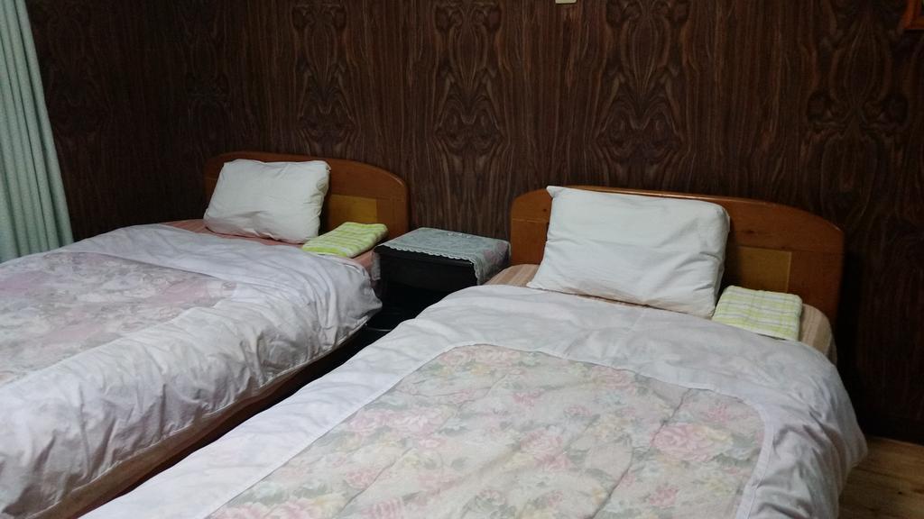 Minshuku Toshi Hotel Якушима Екстериор снимка